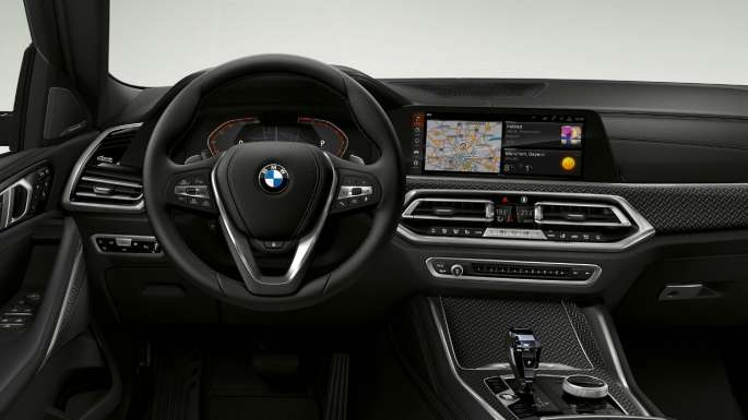 BMW X6 z BMW xLine, kokpit. BMW X6 z BMW xLine, notranjost s poudarkom na kokpitu.