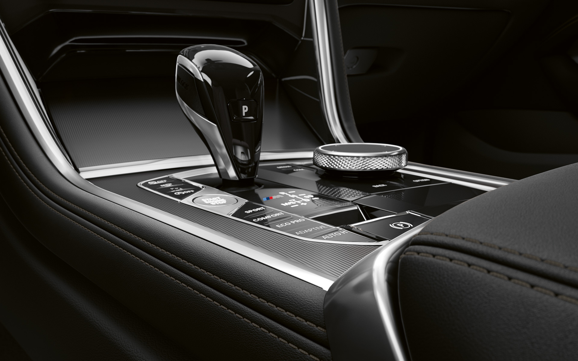 BMW serije 8 Coupé, sredinska konzola Posnetek od blizu sredinske konzole BMW serije 8 Coupé.