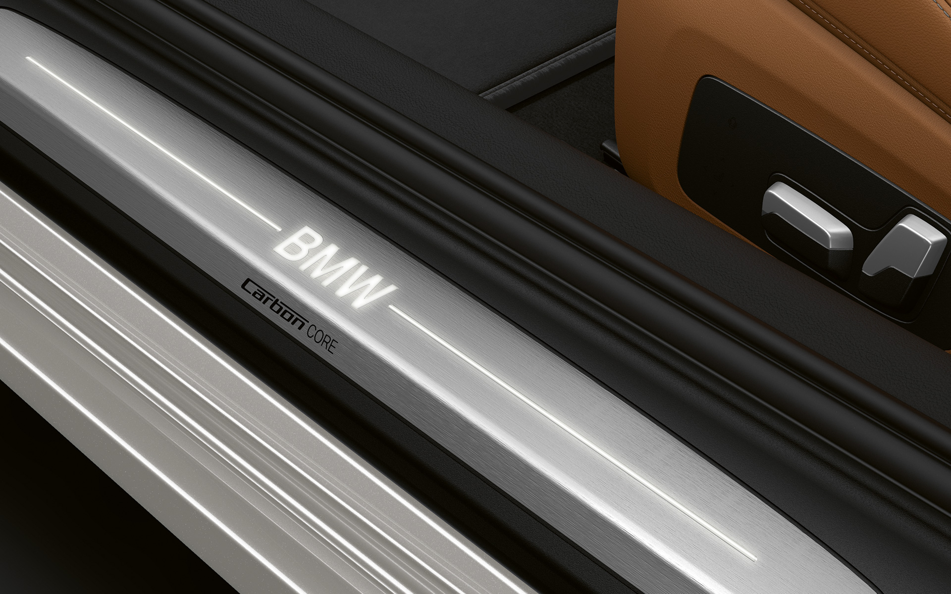 BMW serije 8 Coupé, vstopna letev z logotipom BMW Posnetek od blizu vstopne letve BMW serije 8 Coupé z logotipom BMW.