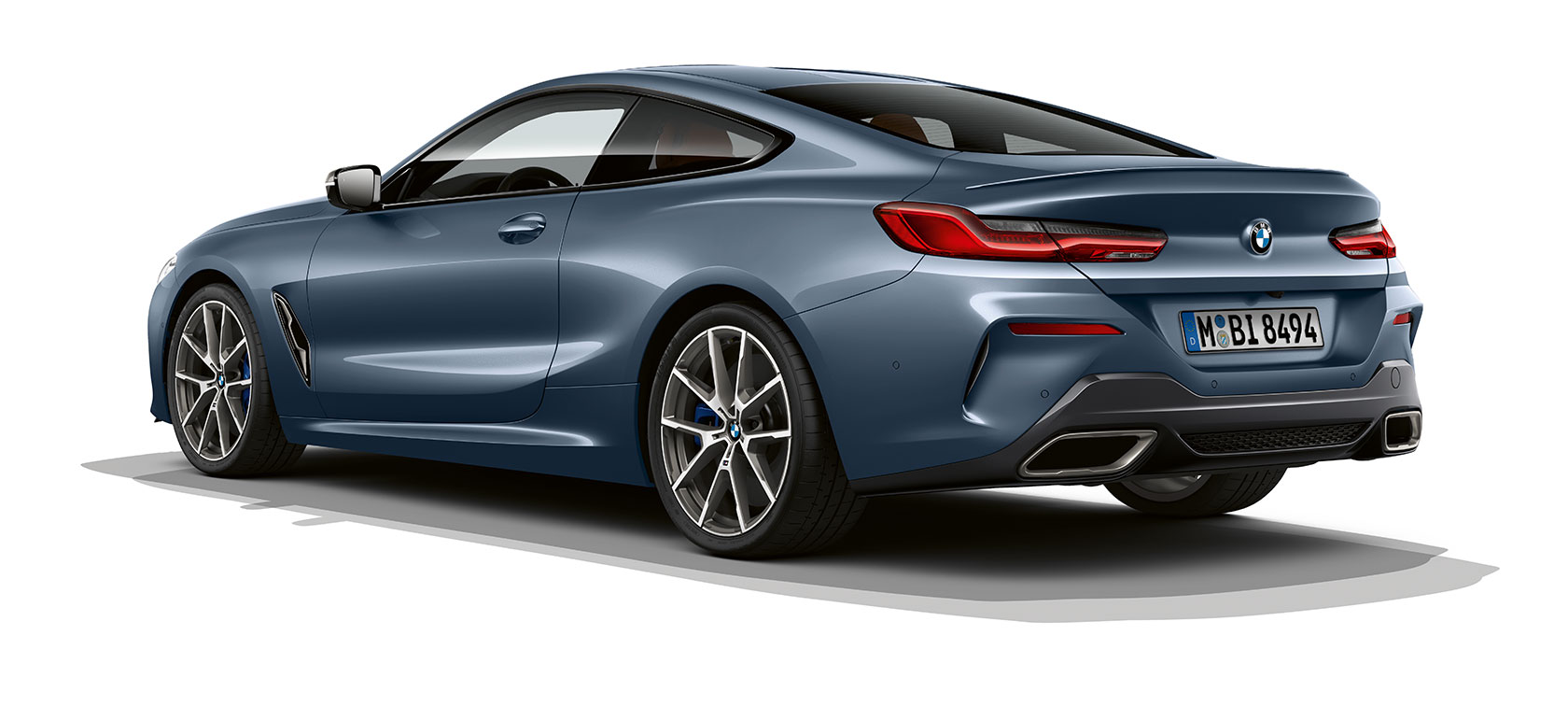 BMW serije 8 Coupé, kovinska barva Barcelona Blue. BMW serije 8 Coupé, kovinska barva Barcelona Blue, tričetrtinski pogled od zadaj.