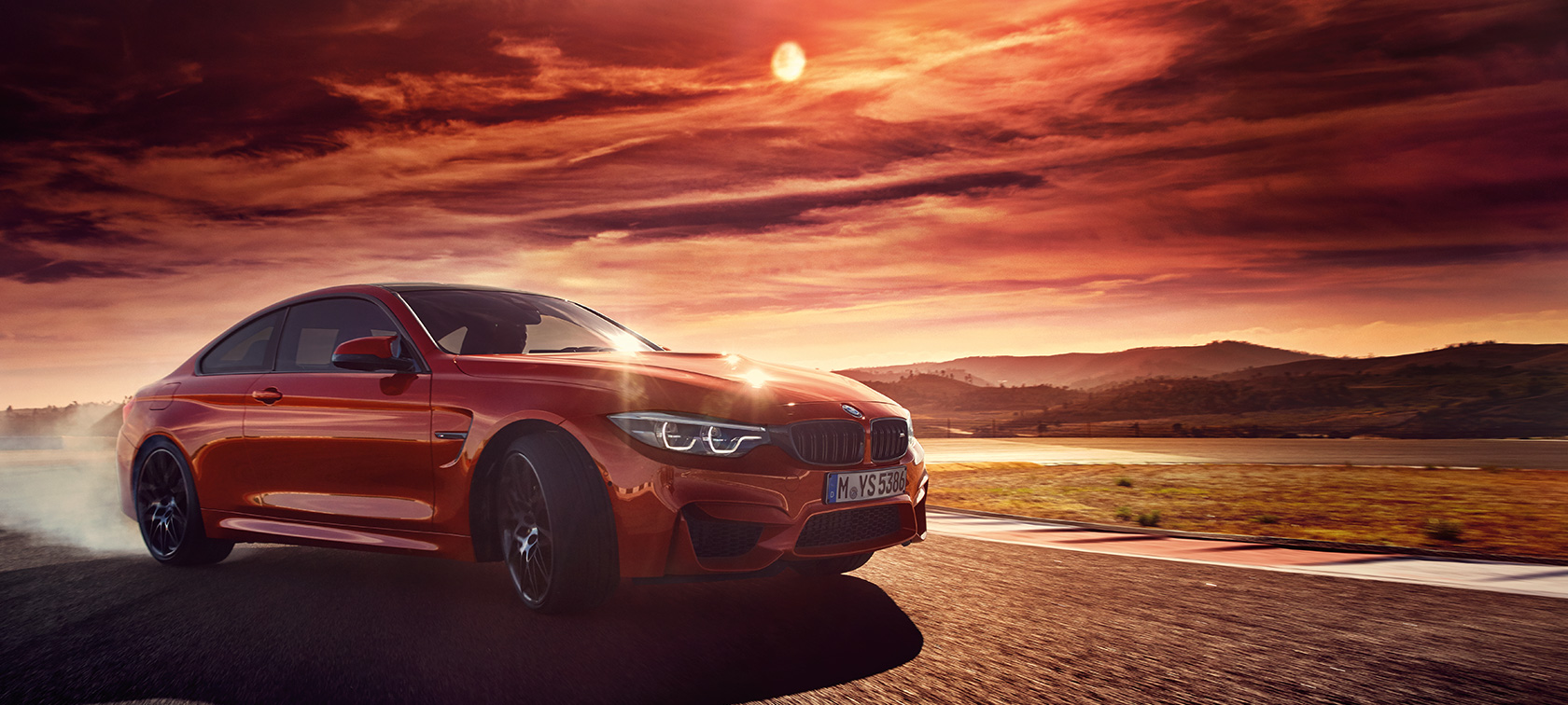 BMW M4 Coupé BMW M4 Coupé, stranski pogled med drsenjem v ovinku