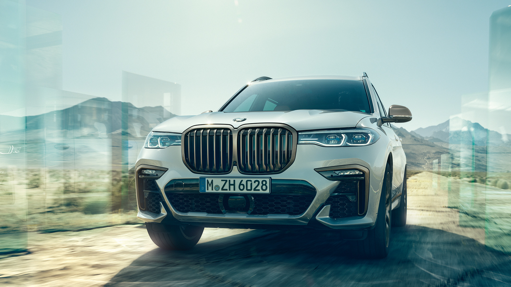 BMW X7 M50d, pogled od spredaj BMW X7 M50d v barvi Mineral White, pogled od spredaj, G07, 2019
