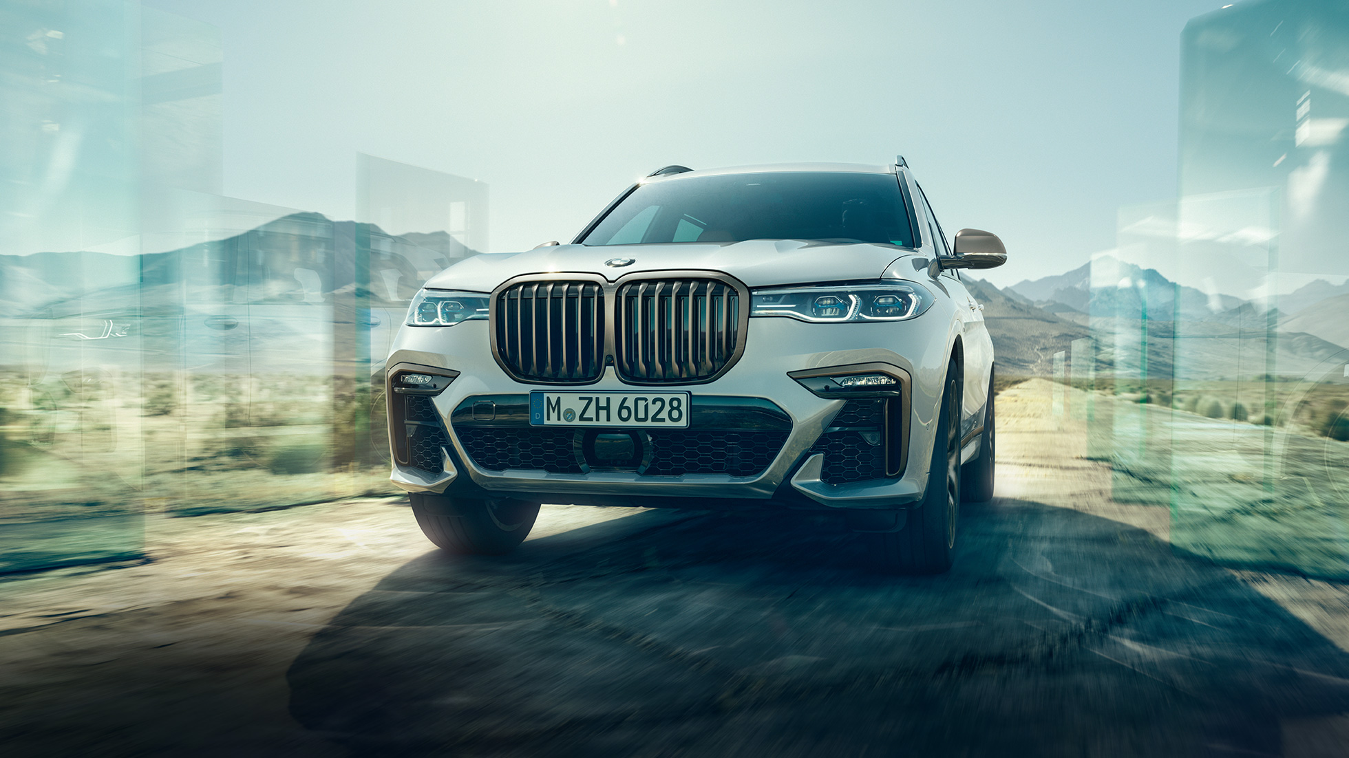 BMW X7 M50d, pogled od spredaj BMW X7 M50d v barvi Mineral White, pogled od spredaj, G07, 2019