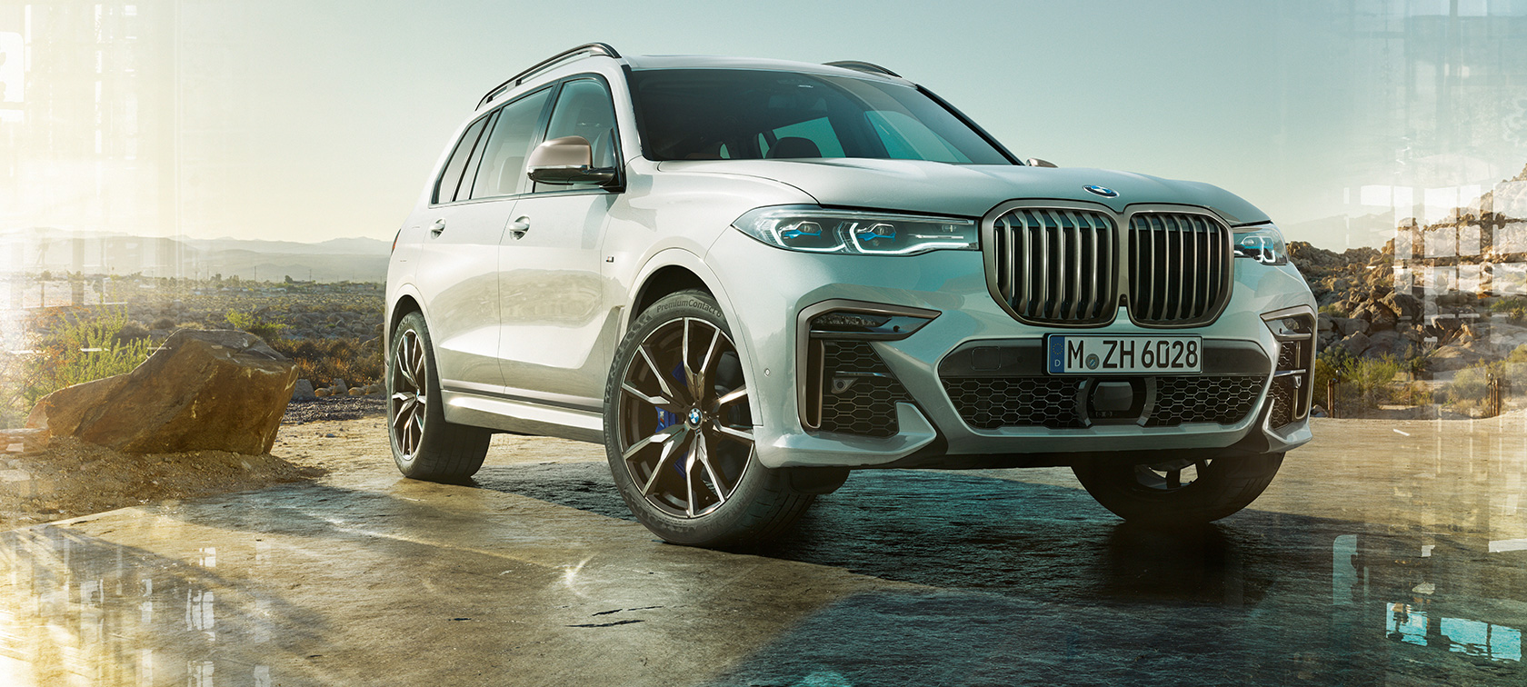 BMW X7 M, G07, 2019, tričetrtinski pogled od spredaj BMW X7 M, G07, 2019, barva Mineral White, tričetrtinski pogled od spredaj med mirovanjem