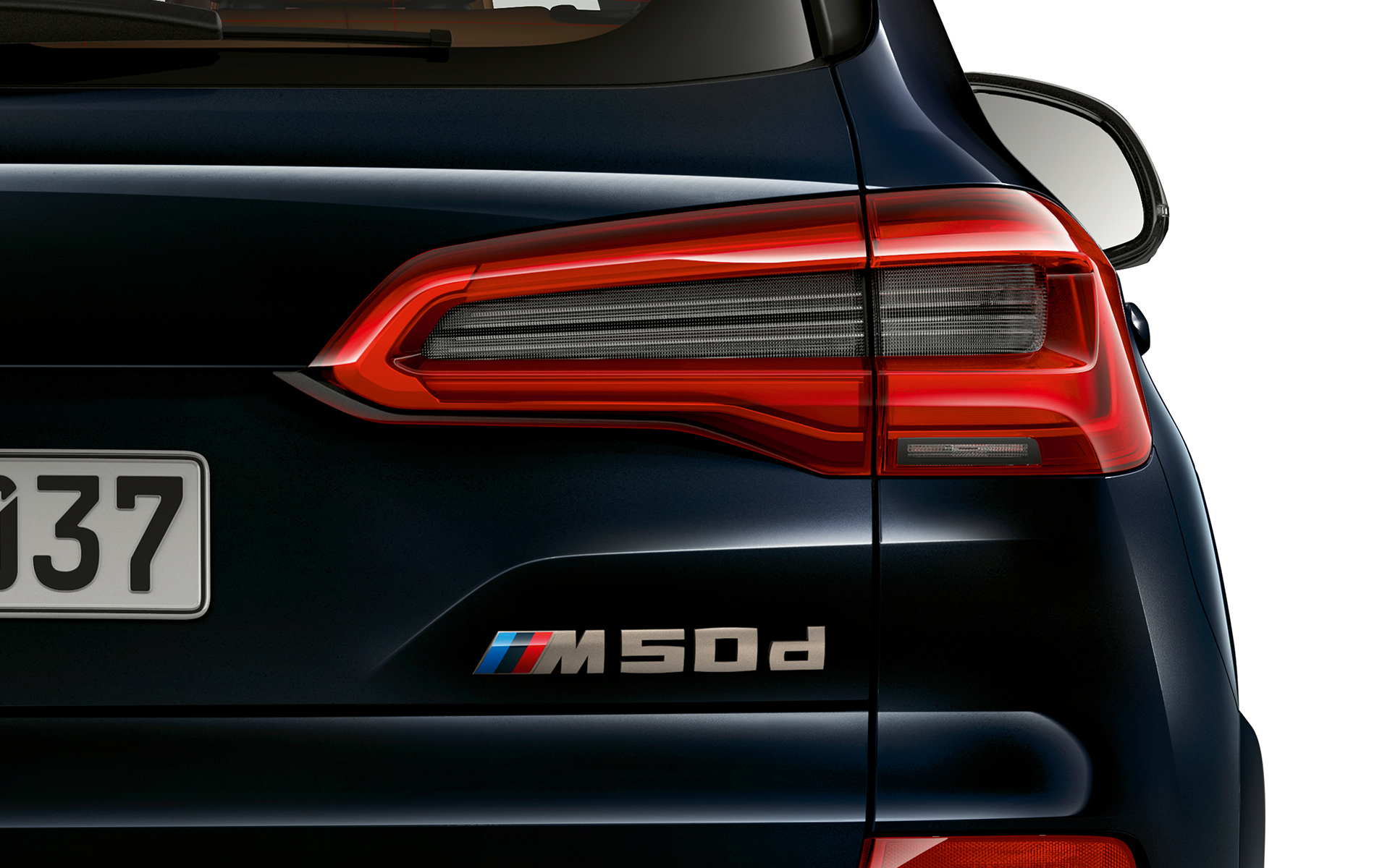 Oznake na zadku vozila BMW X5 M50d Podrobna fotografija oznake modela vozila BMW X5 M50d