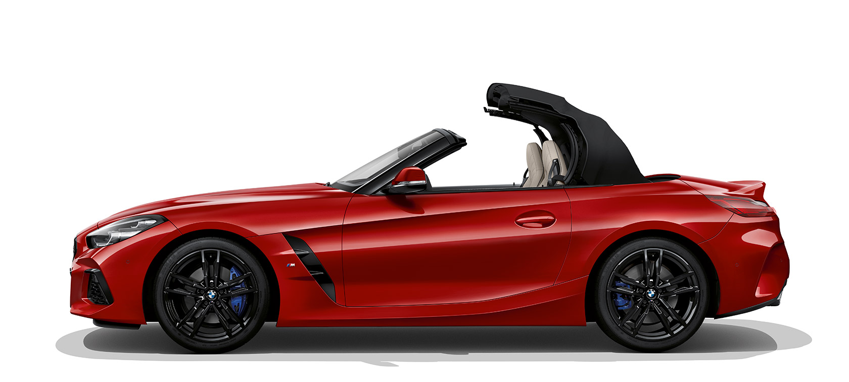 Pogled s strani na BMW Z4 Roadster Pogled s strani na BMW Z4 Roadster, odprta streha